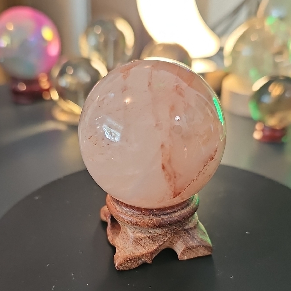 Blush Quartz Sphere on Carved Stand